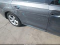 2013 Volkswagen Passat — photo 14 of 17 | VIN 1VWBP7A32DC138274