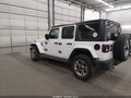 2018 Jeep Wrangler Unlimited — photo 3 of 17 | VIN 1C4HJXEG6JW135707