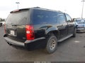 2011 Chevrolet Suburban 1500 — photo 4 of 20 | VIN 1GNSCHE01BR262509