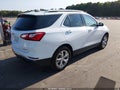 2018 Chevrolet Equinox — photo 4 of 17 | VIN 2GNAXTEX4J6315729