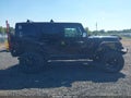 2011 Jeep Wrangler Unlimited — photo 13 of 16 | VIN 1J4BA6H10BL551403