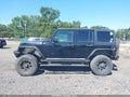 2011 Jeep Wrangler Unlimited — photo 14 of 16 | VIN 1J4BA6H10BL551403