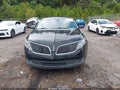 2014 Lincoln MKS — photo 12 of 16 | VIN 1LNHL9DKXEG610184