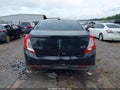 2014 Lincoln MKS — photo 16 of 16 | VIN 1LNHL9DKXEG610184