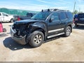 2011 Nissan Xterra — photo 2 of 17 | VIN 5N1AN0NW5BC522347
