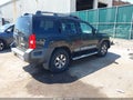 2011 Nissan Xterra — photo 4 of 17 | VIN 5N1AN0NW5BC522347