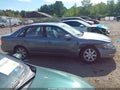 2002 Toyota Avalon — photo 14 of 17 | VIN 4T1BF28B32U199139