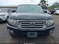2013 Honda Ridgeline — photo 12 of 18 | VIN 5FPYK1F54DB002516