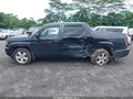 2013 Honda Ridgeline — photo 14 of 18 | VIN 5FPYK1F54DB002516