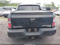 2013 Honda Ridgeline — photo 16 of 18 | VIN 5FPYK1F54DB002516