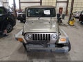 2004 Jeep Wrangler — photo 12 of 18 | VIN 1J4FA39S64P787301