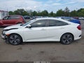 2018 Honda Civic — photo 15 of 17 | VIN JHMFC1F77JX041034