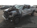 2021 Toyota Tacoma — photo 2 of 17 | VIN 3TMDZ5BNXMM115463