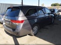 2015 Honda Odyssey — photo 4 of 16 | VIN 5FNRL5H2XFB083688