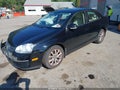 2010 Volkswagen Jetta — photo 2 of 14 | VIN 3VWRZ7AJ3AM105348