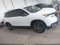 2021 Honda Passport — photo 13 of 16 | VIN 5FNYF8H51MB022693