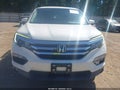 2018 Honda Pilot — photo 12 of 16 | VIN 5FNYF5H54JB023833