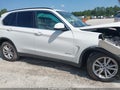 2015 BMW X5 — photo 13 of 16 | VIN 5UXKR0C58F0P18618