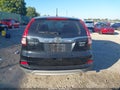 2016 Honda CR-V — photo 16 of 16 | VIN 2HKRM4H55GH706364