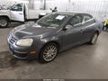 2009 Volkswagen Jetta — photo 2 of 11 | VIN 3VWRJ71K39M042831