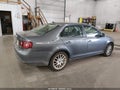 2009 Volkswagen Jetta — photo 4 of 11 | VIN 3VWRJ71K39M042831