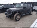 2017 Jeep Wrangler Unlimited — photo 2 of 16 | VIN 1C4BJWDG1HL567358