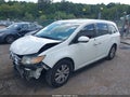 2014 Honda Odyssey — photo 2 of 17 | VIN 5FNRL5H6XEB060560