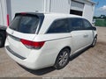 2014 Honda Odyssey — photo 4 of 17 | VIN 5FNRL5H6XEB060560