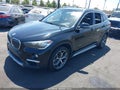 2018 BMW X1 — photo 2 of 11 | VIN WBXHT3Z36J4A66965