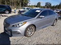 2015 Hyundai Sonata — photo 2 of 18 | VIN 5NPE34AF9FH119166