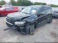 2023 Volkswagen Taos — photo 2 of 16 | VIN 3VVCX7B2XPM323402