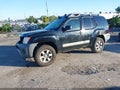 2012 Nissan Xterra — photo 2 of 15 | VIN 5N1AN0NWXCC508946