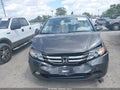 2014 Honda Odyssey — photo 12 of 16 | VIN 5FNRL5H97EB019829