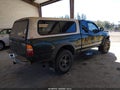 2003 Toyota Tacoma — photo 4 of 17 | VIN 5TEWN72NX3Z301022