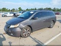 2015 Honda Odyssey — photo 2 of 17 | VIN 5FNRL5H99FB002225