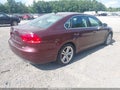 2014 Volkswagen Passat — photo 4 of 11 | VIN 1VWBN7A39EC093910