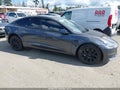 2023 Tesla Model 3 — photo 13 of 16 | VIN 5YJ3E1EA2PF652362