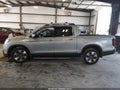 2019 Honda Ridgeline — photo 14 of 16 | VIN 5FPYK3F71KB033751