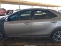 2016 Toyota Corolla — photo 14 of 16 | VIN 5YFBURHE7GP377796