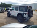 2021 Jeep Wrangler — photo 3 of 19 | VIN 1C4JJXR64MW703668