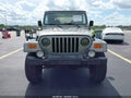 2001 Jeep Wrangler — photo 12 of 16 | VIN 1J4FA49S11P364000