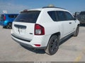 2015 Jeep Compass — photo 4 of 18 | VIN 1C4NJCBA6FD398696