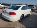 2014 Volkswagen Passat — photo 4 of 12 | VIN 1VWBN7A34EC097900