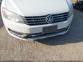 2014 Volkswagen Passat — photo 6 of 12 | VIN 1VWBN7A34EC097900