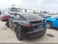 2022 Tesla Model Y — photo 3 of 15 | VIN 7SAYGDEE3NF331340
