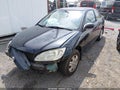 2004 Honda Civic — photo 2 of 18 | VIN 1HGEM22144L078170