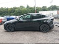 2021 Tesla Model Y — photo 14 of 16 | VIN 5YJYGDEE0MF208185
