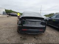 2021 Tesla Model Y — photo 16 of 16 | VIN 5YJYGDEE0MF208185