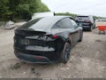 2021 Tesla Model Y — photo 4 of 16 | VIN 5YJYGDEE0MF208185