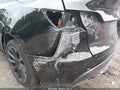 2021 Tesla Model Y — photo 6 of 16 | VIN 5YJYGDEE0MF208185